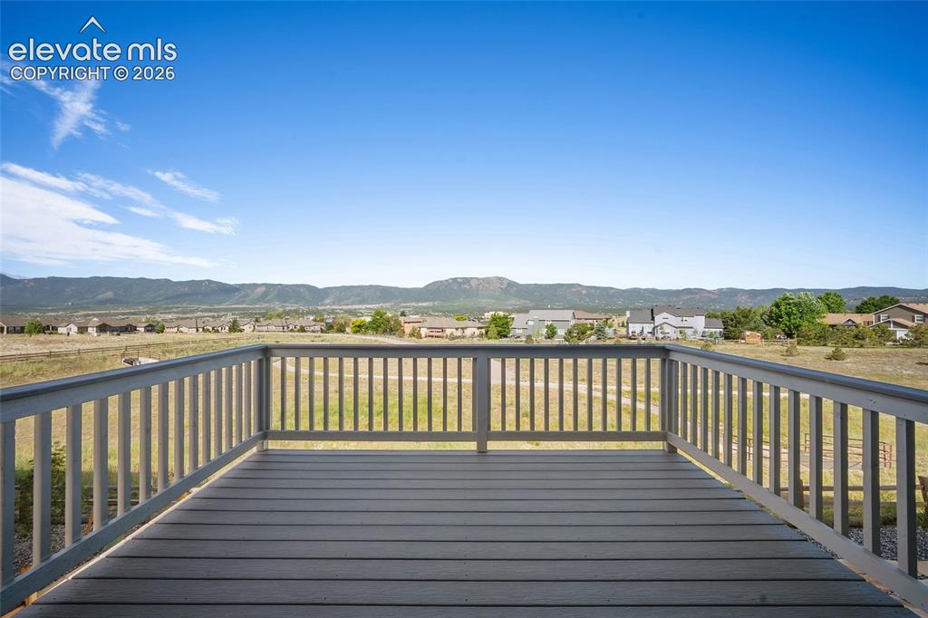 Image 9 of 49: Covered Deck with Views and Open Space