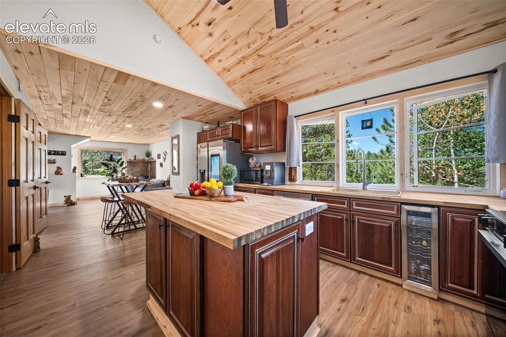 Image 10 of 42: Main level kitchen and dining