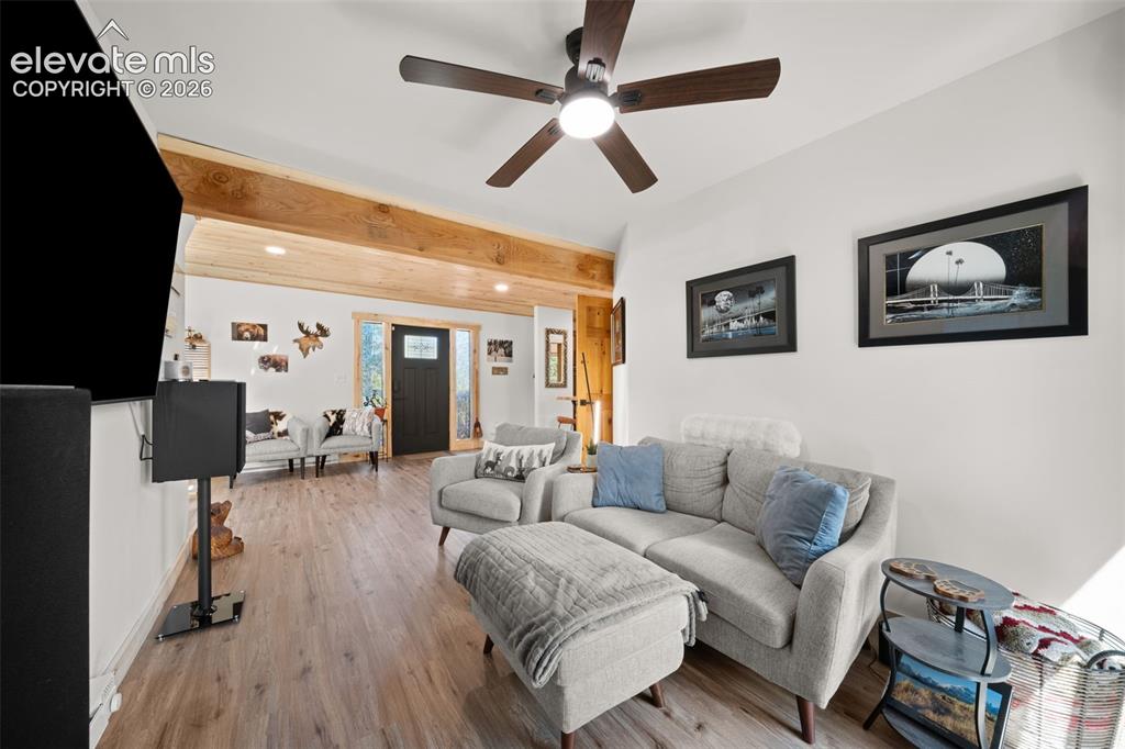 Image 13 of 42: Main level living area and sitting area