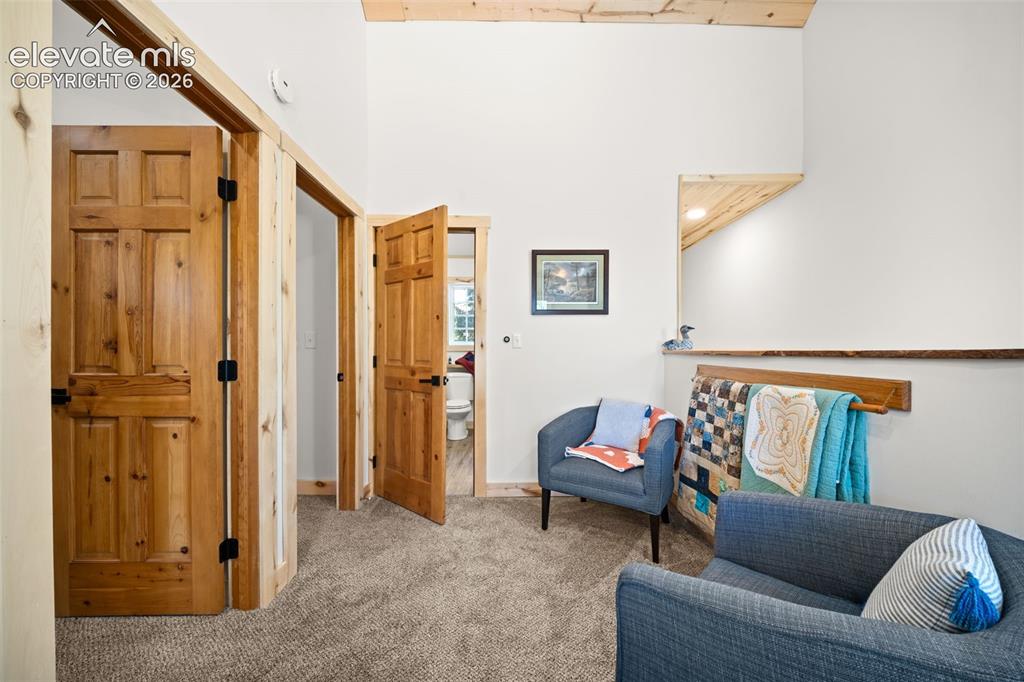 Image 20 of 42: Upper level loft area