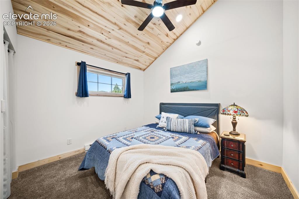 Image 21 of 42: Upper level bedroom