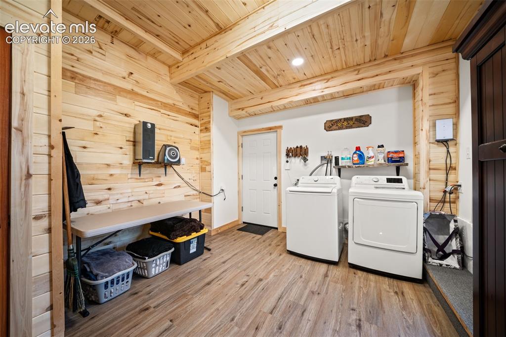 Image 24 of 42: Basement level laundry room. mechanical room and storage