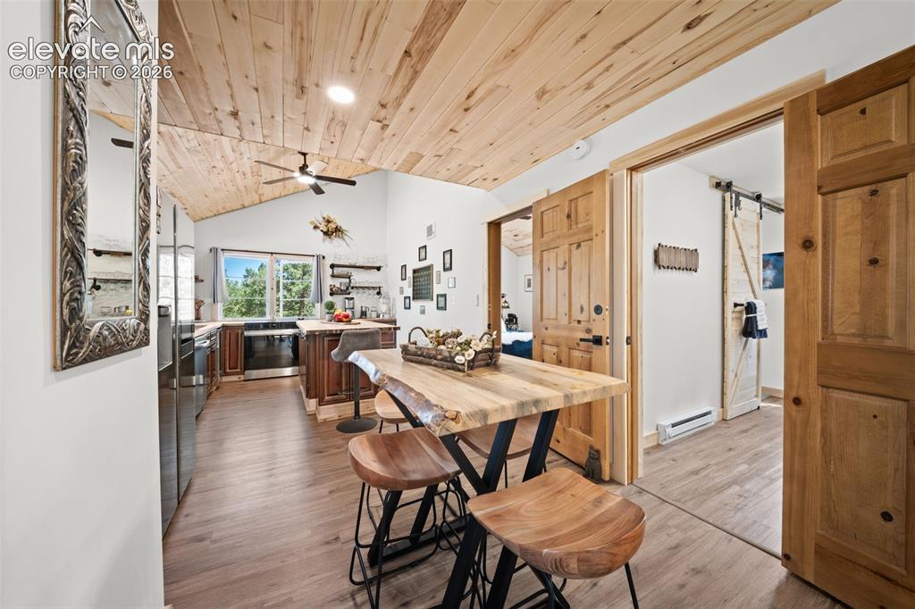 Image 5 of 42: Main level dining and kitchen area