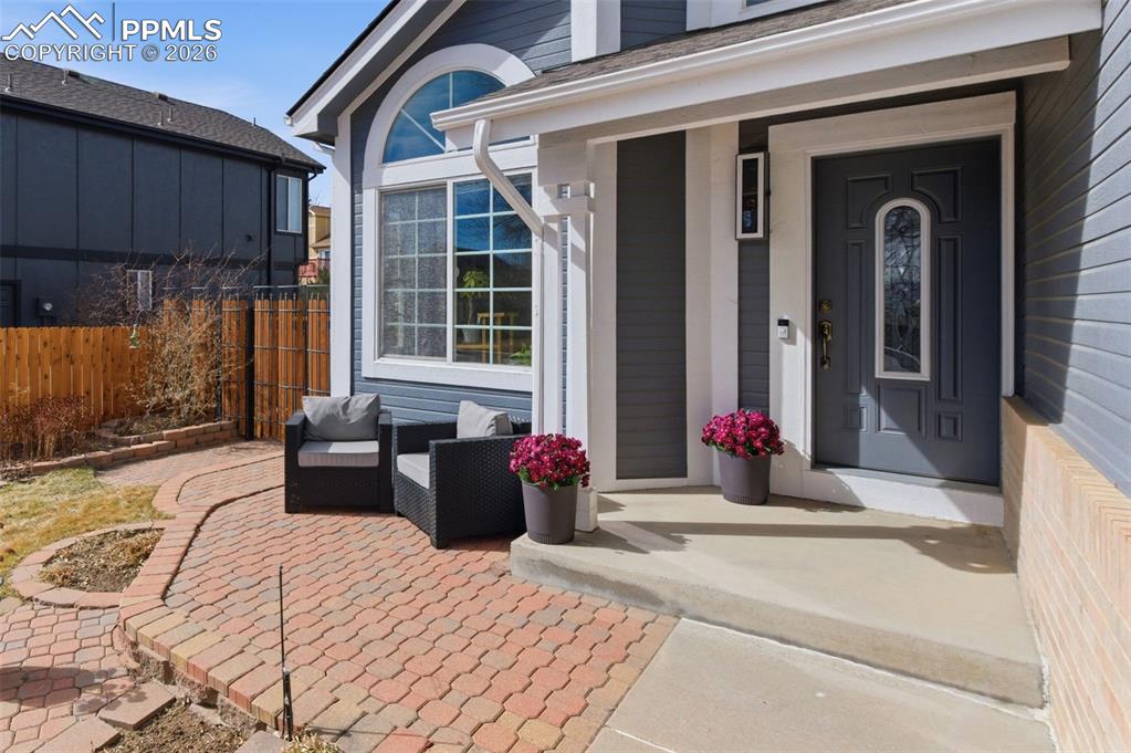 Image 2 of 44: Enjoy morning coffee on this delightful covered patio that faces east.