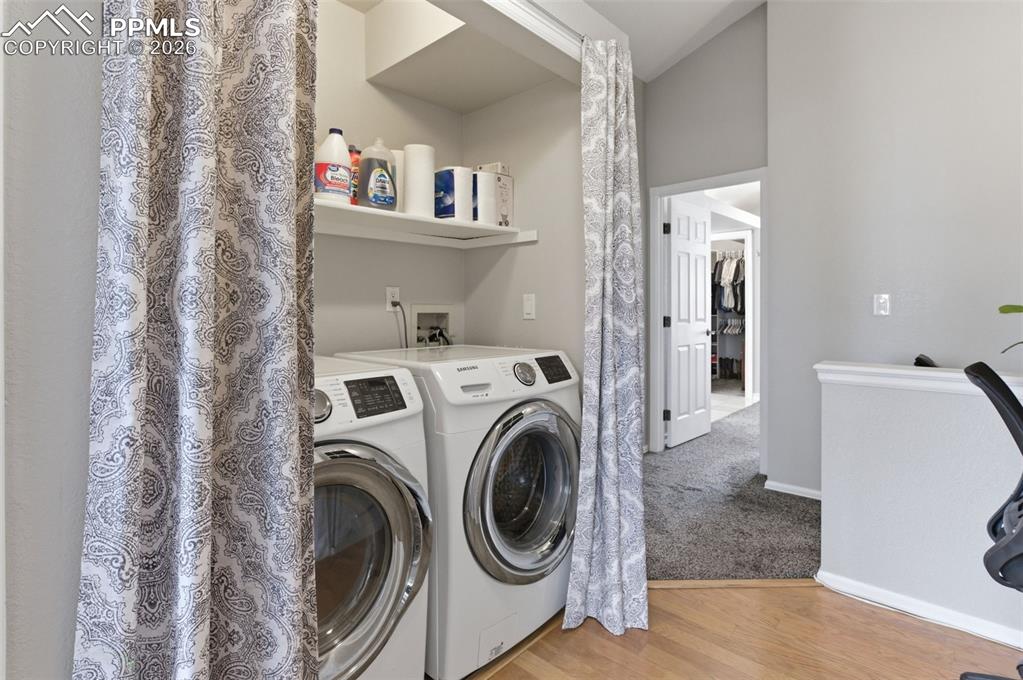 Image 23 of 44: upscale washer & dryer are included and conveniently located on the upper f