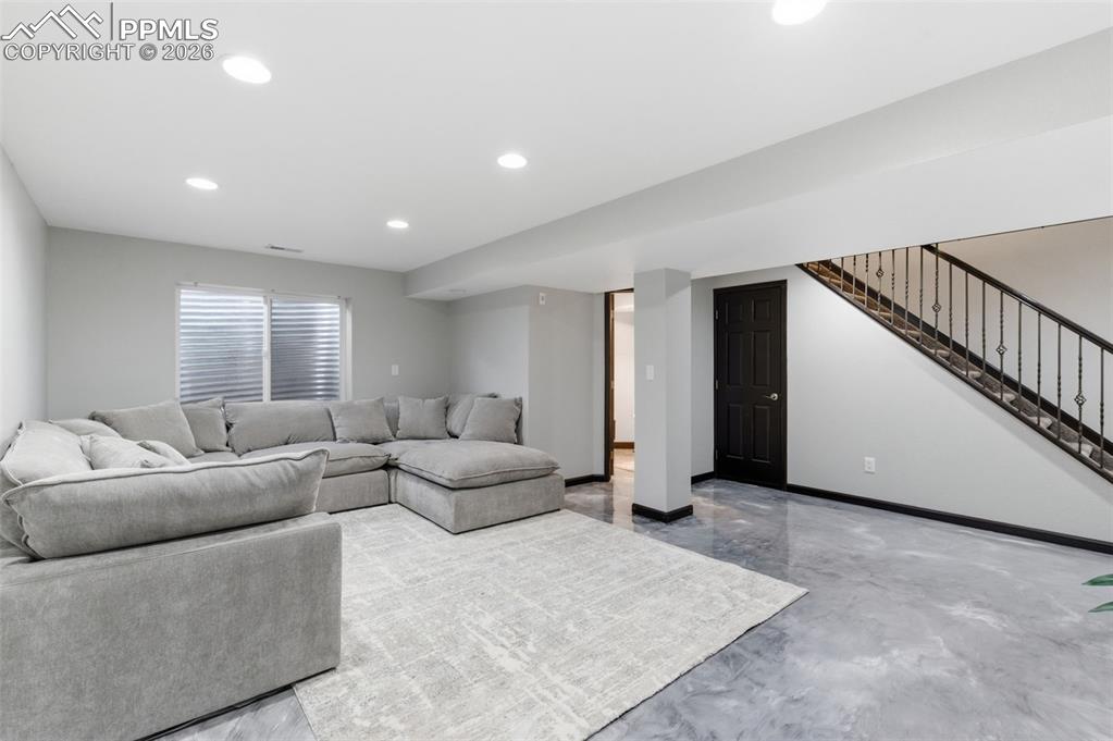 Image 29 of 44: The family/Recreation room offers so many options: movies & games; workouts