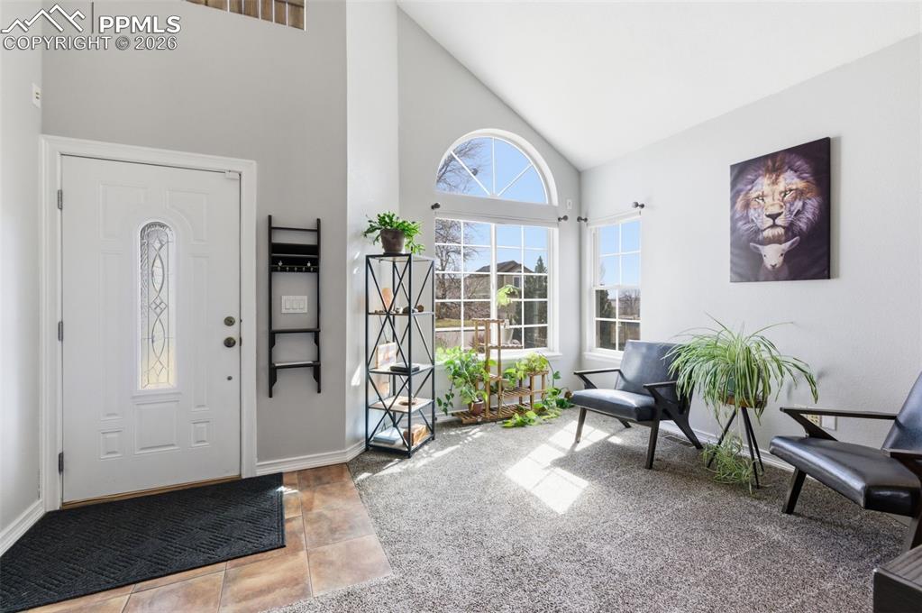 Image 3 of 44: soaring ceilings, bright nat