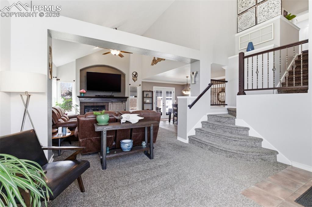 Image 4 of 44: Elegant wood & iron stair rails add charm and beauty