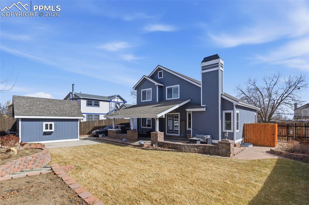 Image 41 of 44: Thoughtfully and creatively designed, the backyard offers full landscaping 