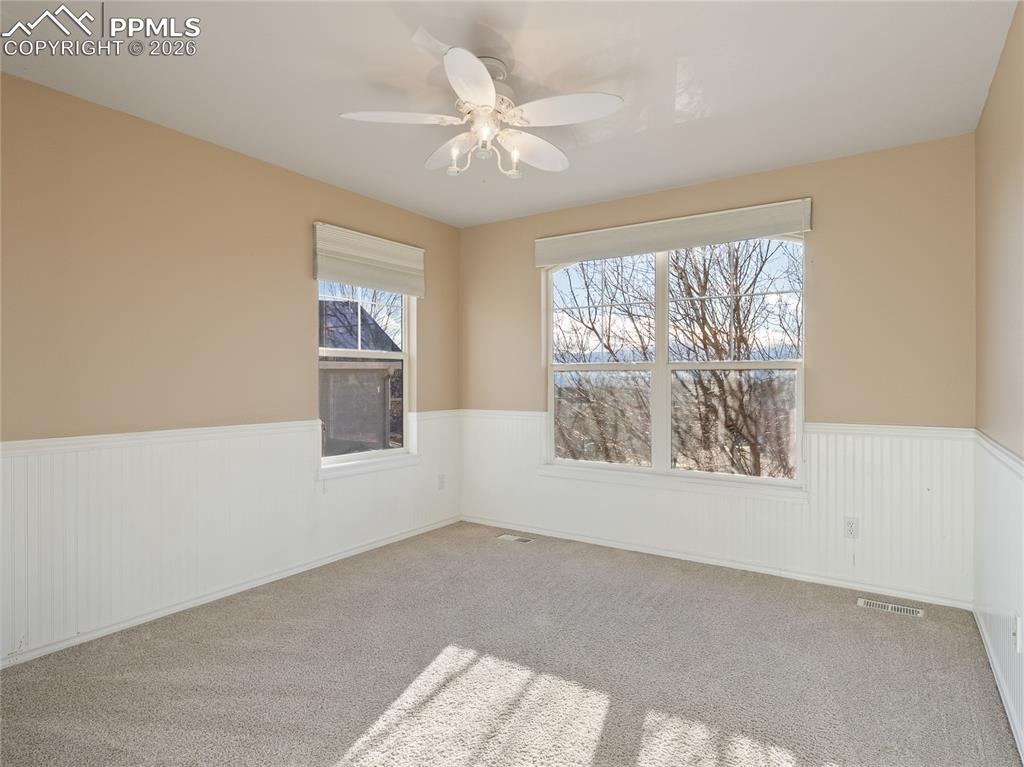 Image 34 of 46: Upper level bedroom