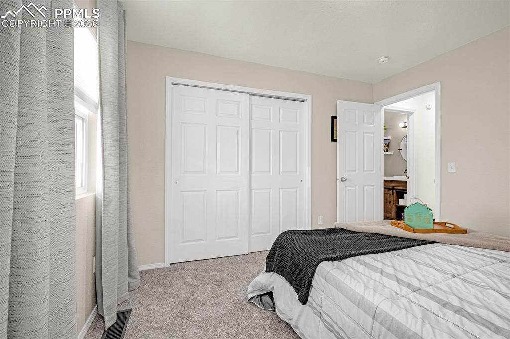 Image 12 of 33: Bedroom