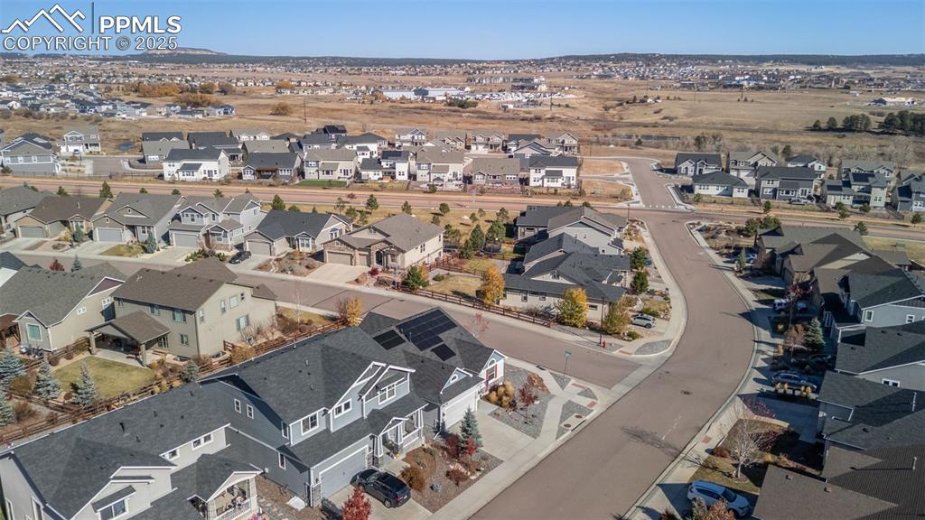 Image 46 of 48: View of property location with nearby suburban area