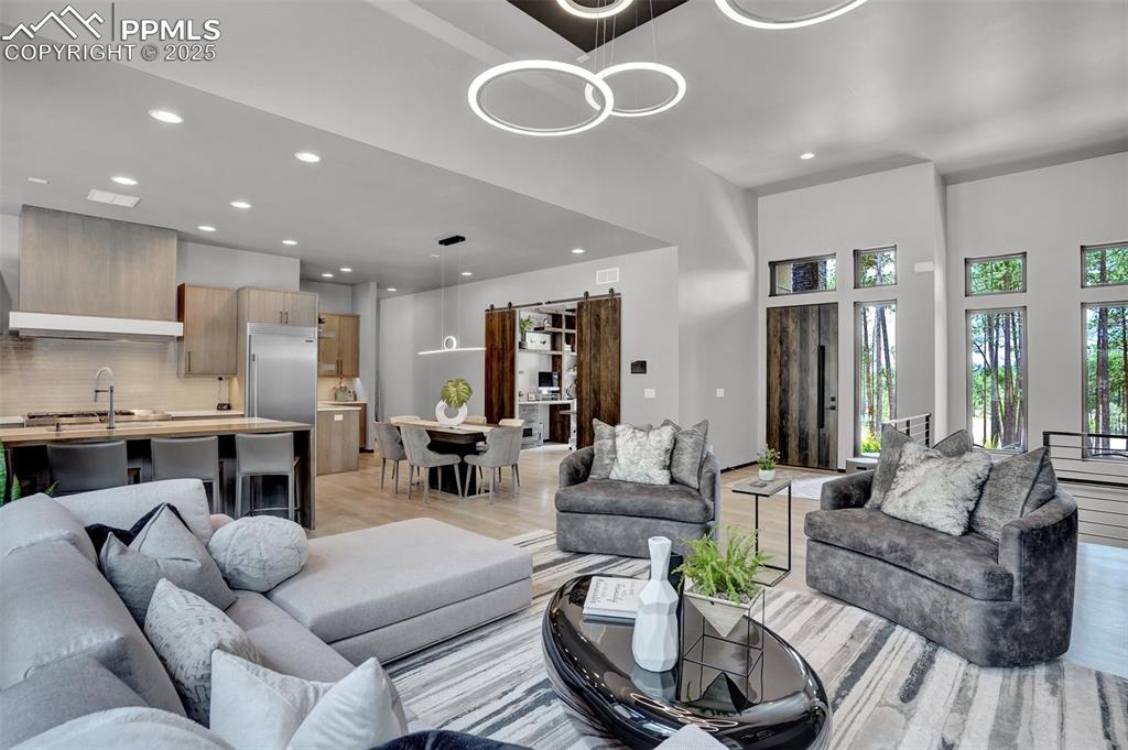 Image 6 of 36: Dynamic open spaces create an inviting enviornment.