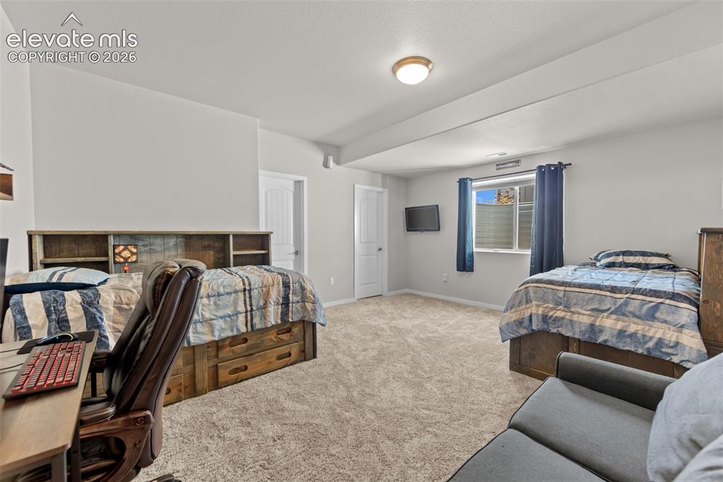 Image 23 of 32: 2nd Primary Suite in the basement with attached 9x5 bathroom with large 9x5