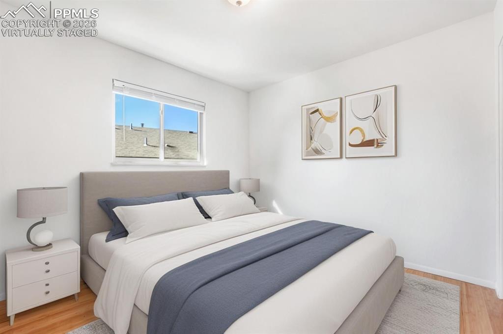 Image 21 of 28: Virtually staged Bedroom #2