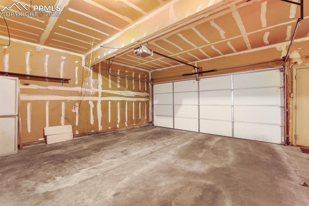 Image 24 of 28: Shared attached garage