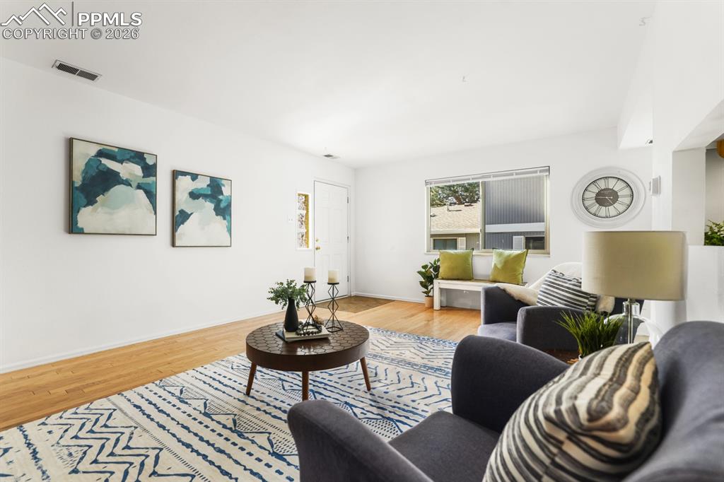 Image 5 of 28: View of the Entry into the Living Room.