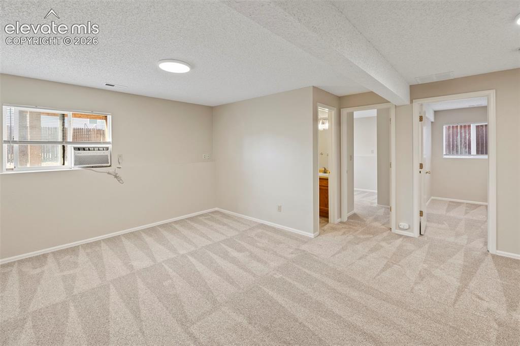 Image 26 of 38: Lower Level Family Room
