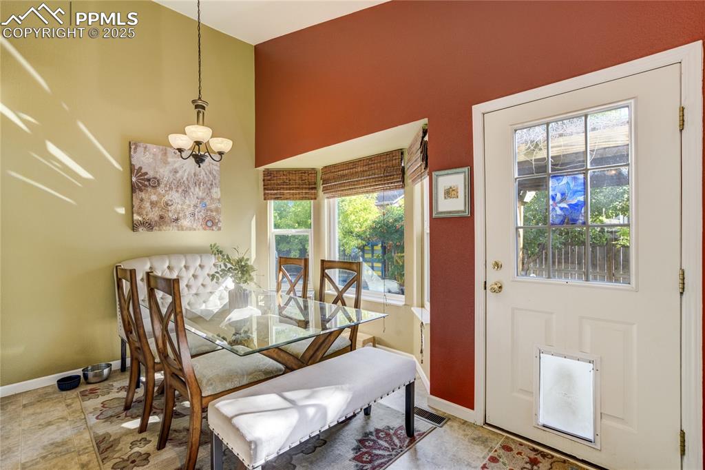 Image 10 of 50: Perfect spot for casual meals or holiday celebrations.