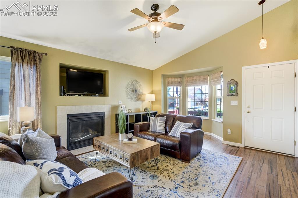 Image 7 of 50: Inviting gas fireplace creates a warm focal point for gatherings.