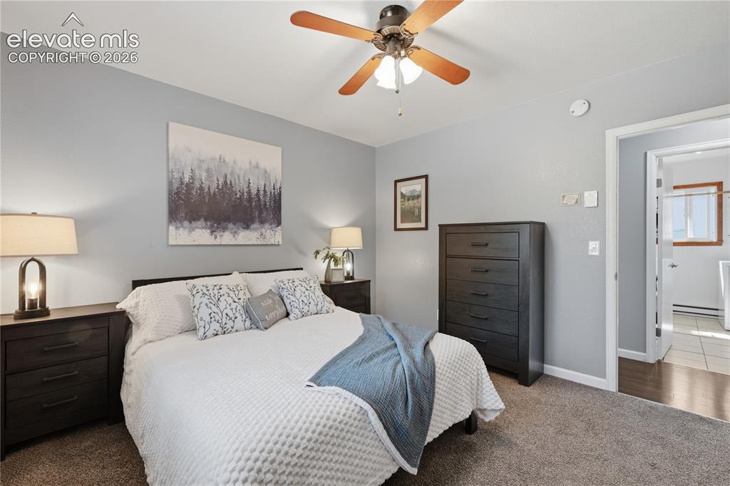 Image 10 of 27: Additional bedroom features great natural light and flexible space to suit