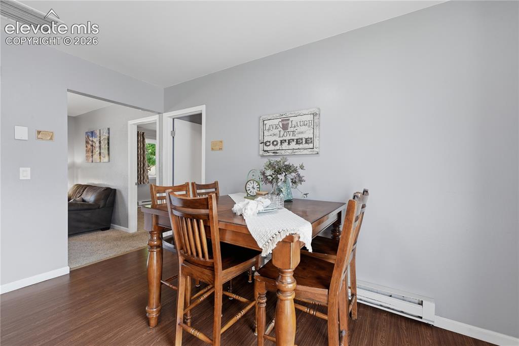 Image 14 of 27: Dedicated dining space offers an easy setting for casual meals, morning cof
