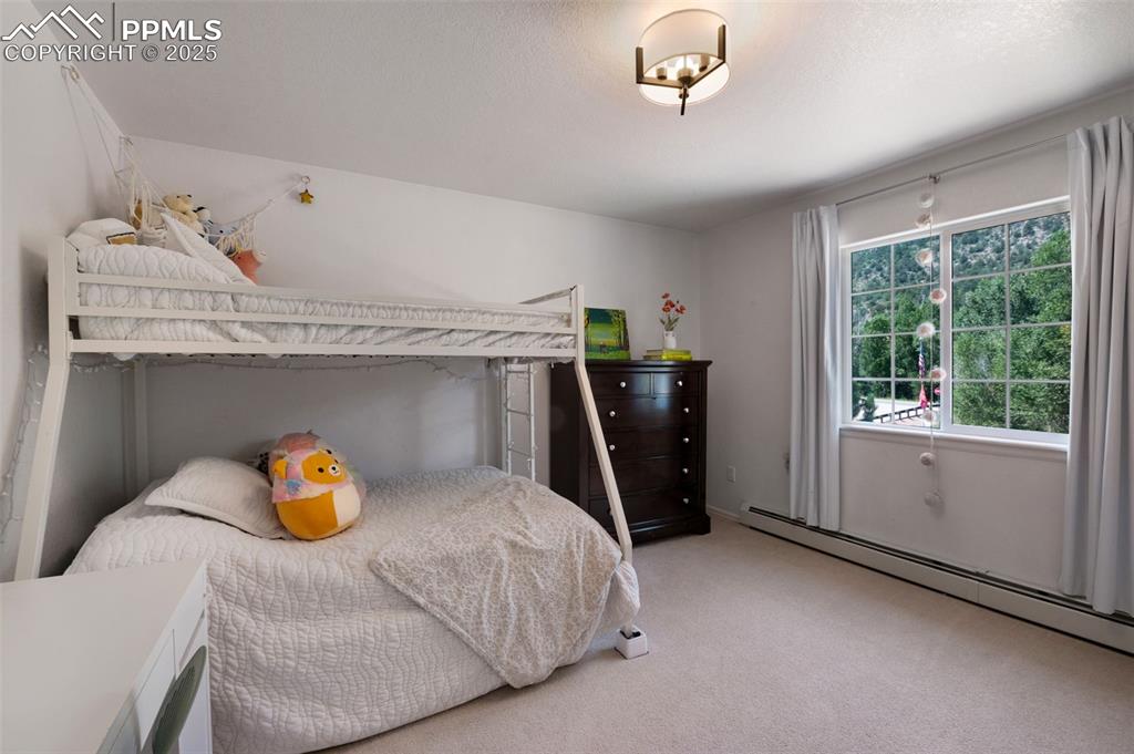 Image 21 of 39: Bedroom