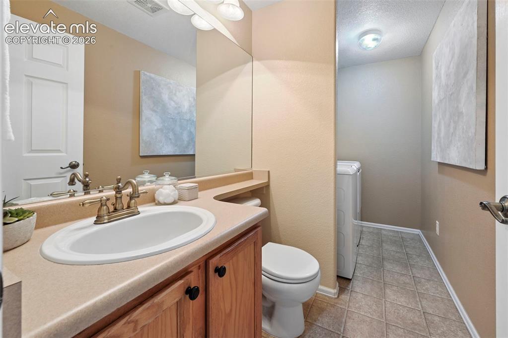Image 13 of 32: Lower level bathroom