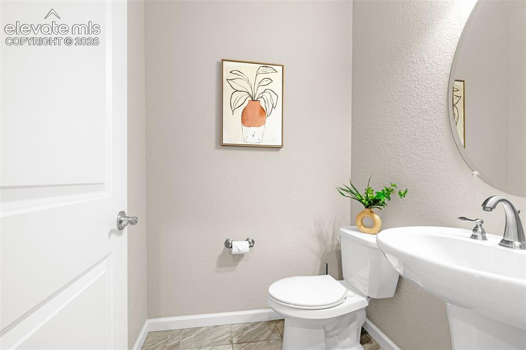 Image 11 of 35: Main level powder room