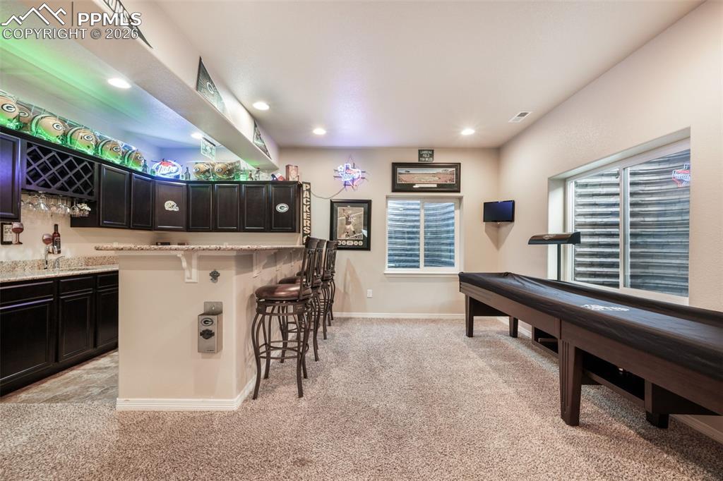 Image 36 of 50: Basement family room