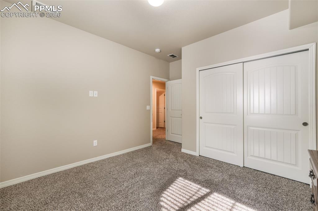 Image 39 of 50: Basement bar