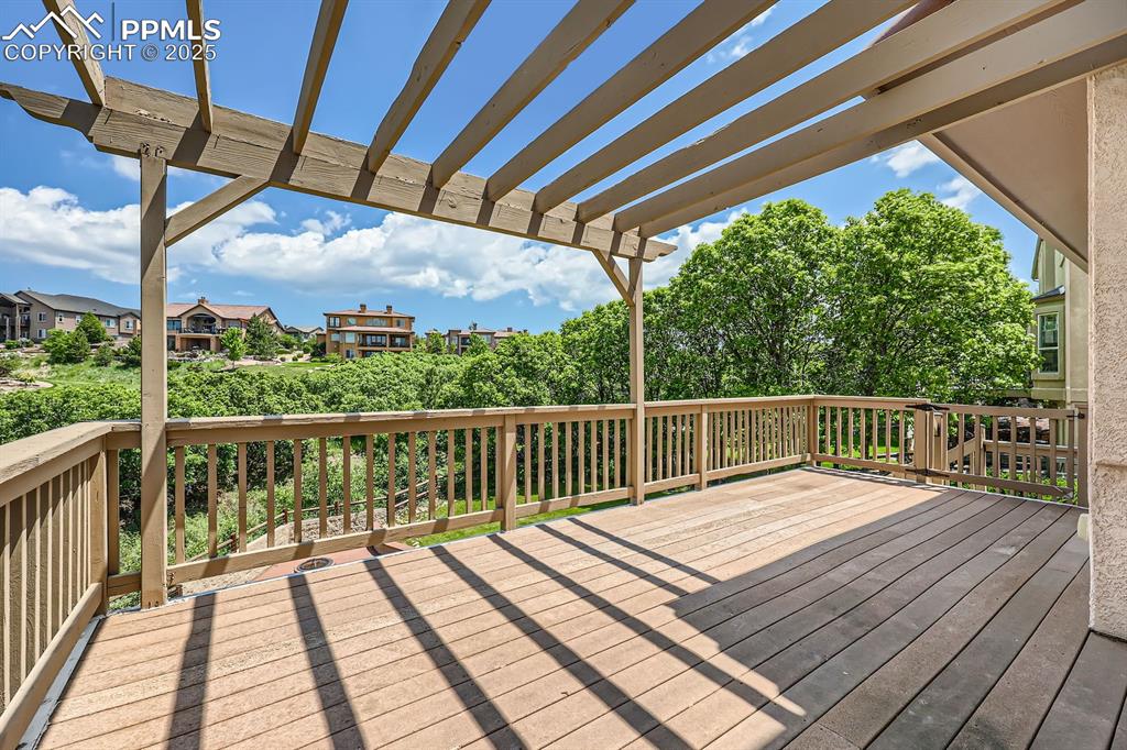 Image 12 of 48: Rear deck backyard