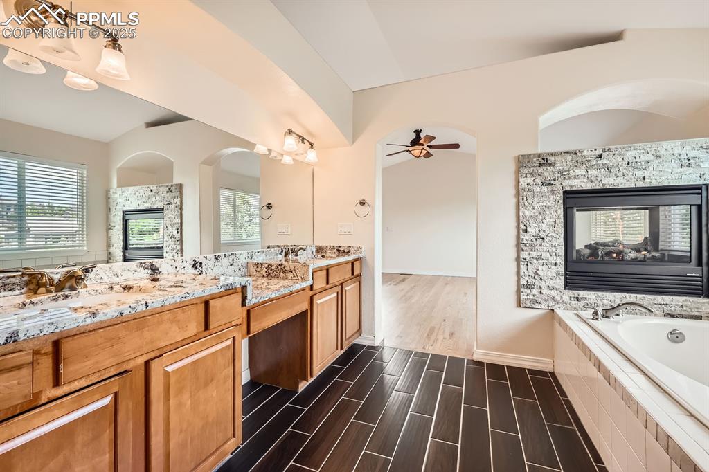 Image 24 of 48: Master bathroom, double sinks