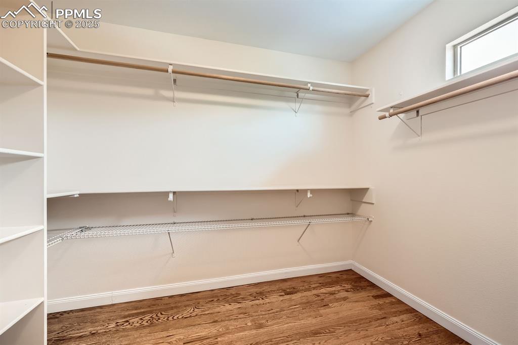 Image 27 of 48: Master walk-in closet