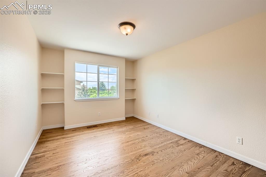 Image 30 of 48: Upper level secondary bedroom