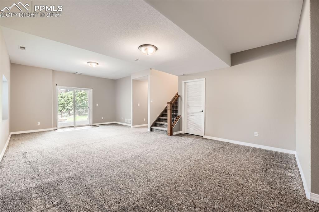 Image 33 of 48: Lower level walkout rec-room