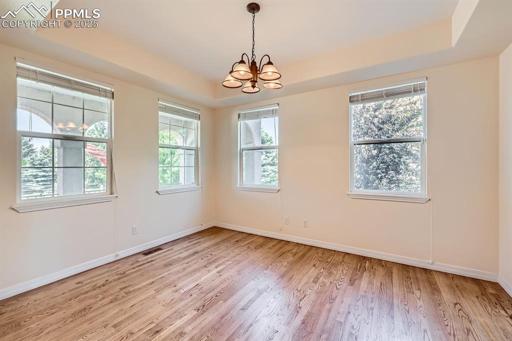 Image 6 of 48: Formal dining room, coffered ceiling