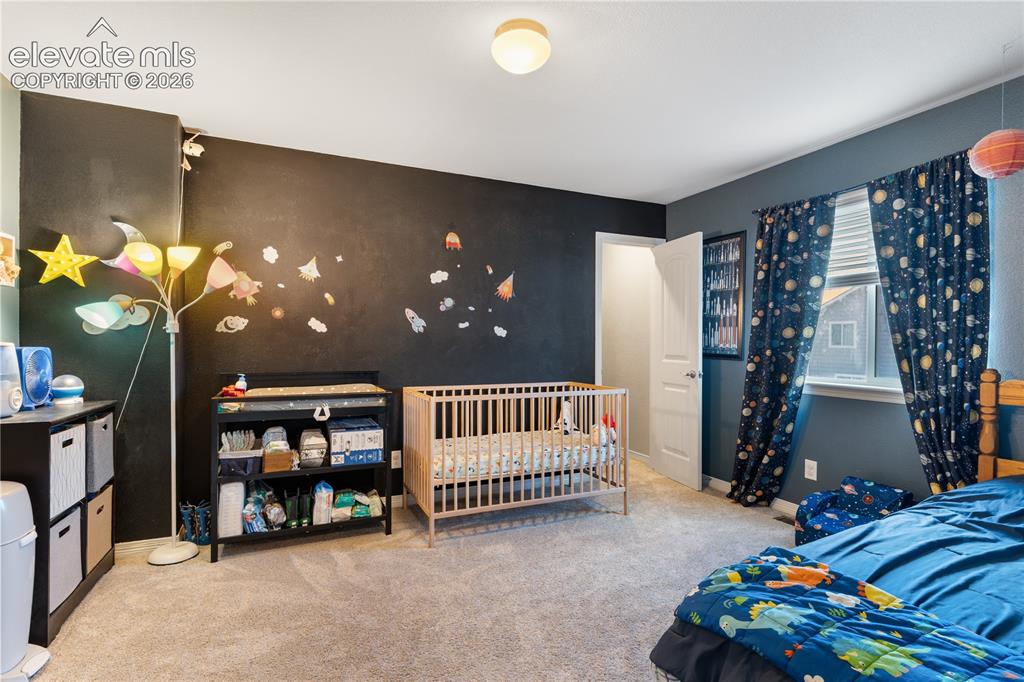 Image 35 of 43: Larger size secondary bedroom with walk in closet