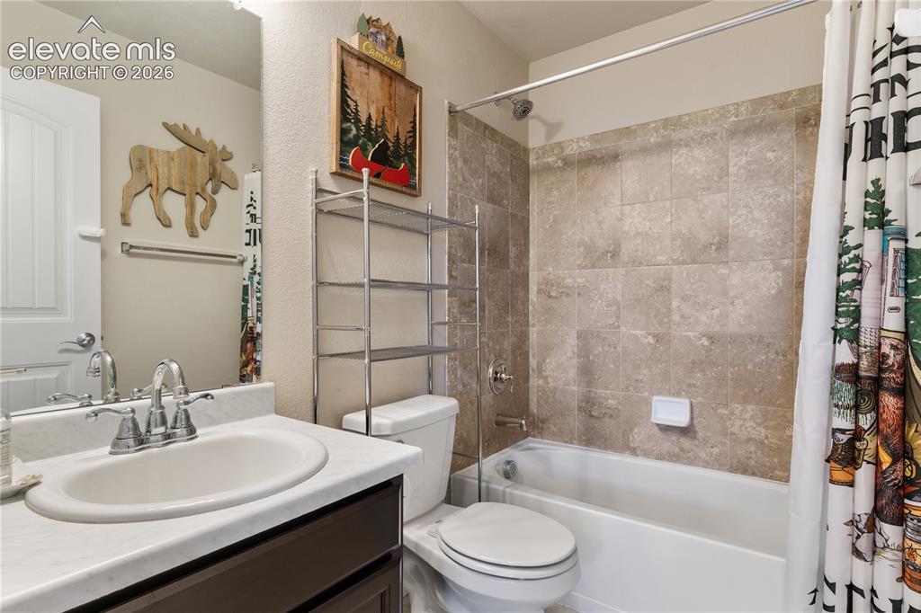 Image 36 of 43: upstairs full bathroom for secondary bedrooms