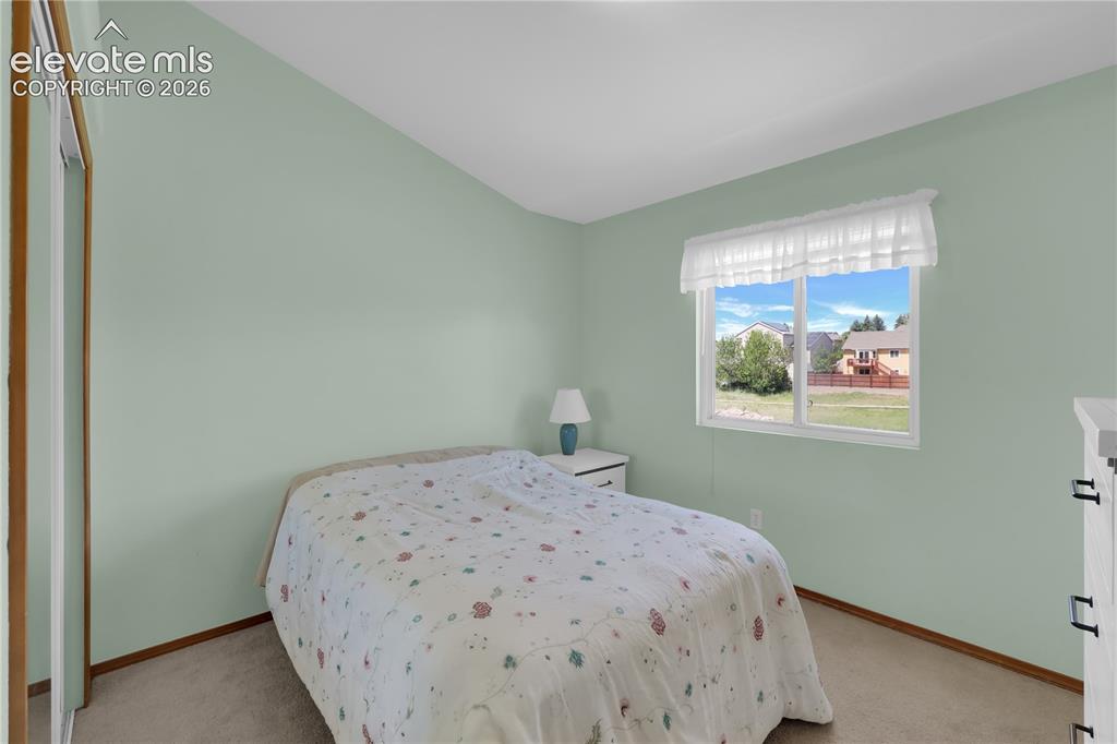Image 14 of 27: Bedroom 2 Main-level
