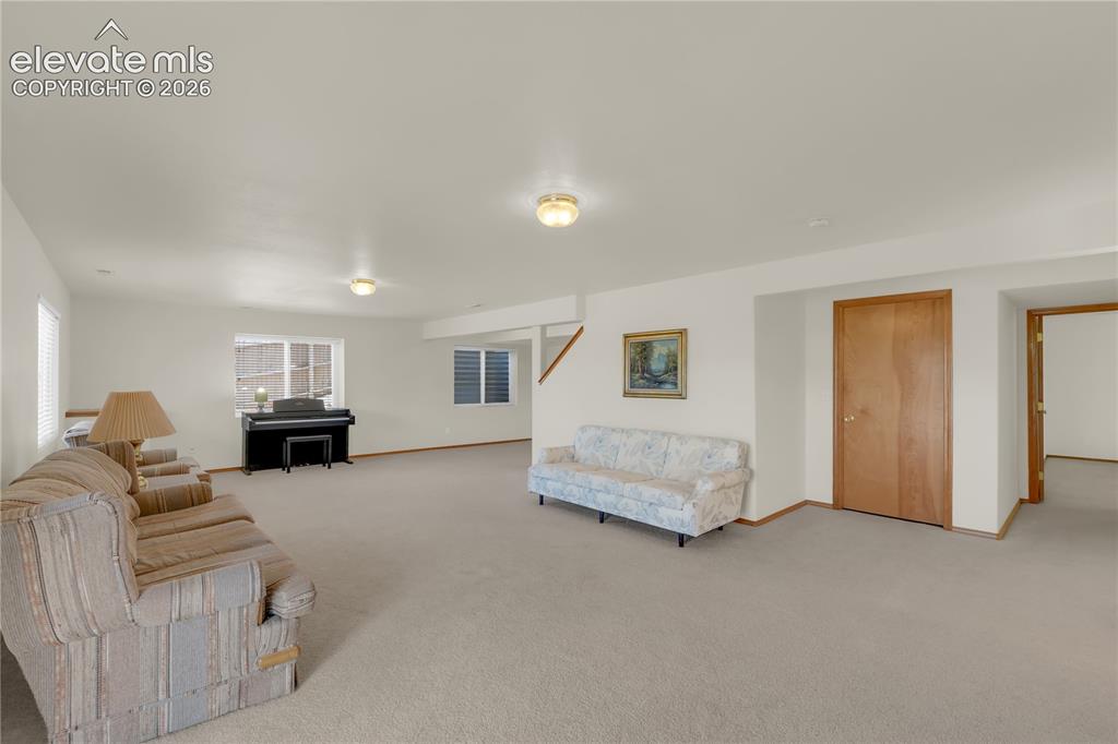 Image 16 of 27: Basement Family Room