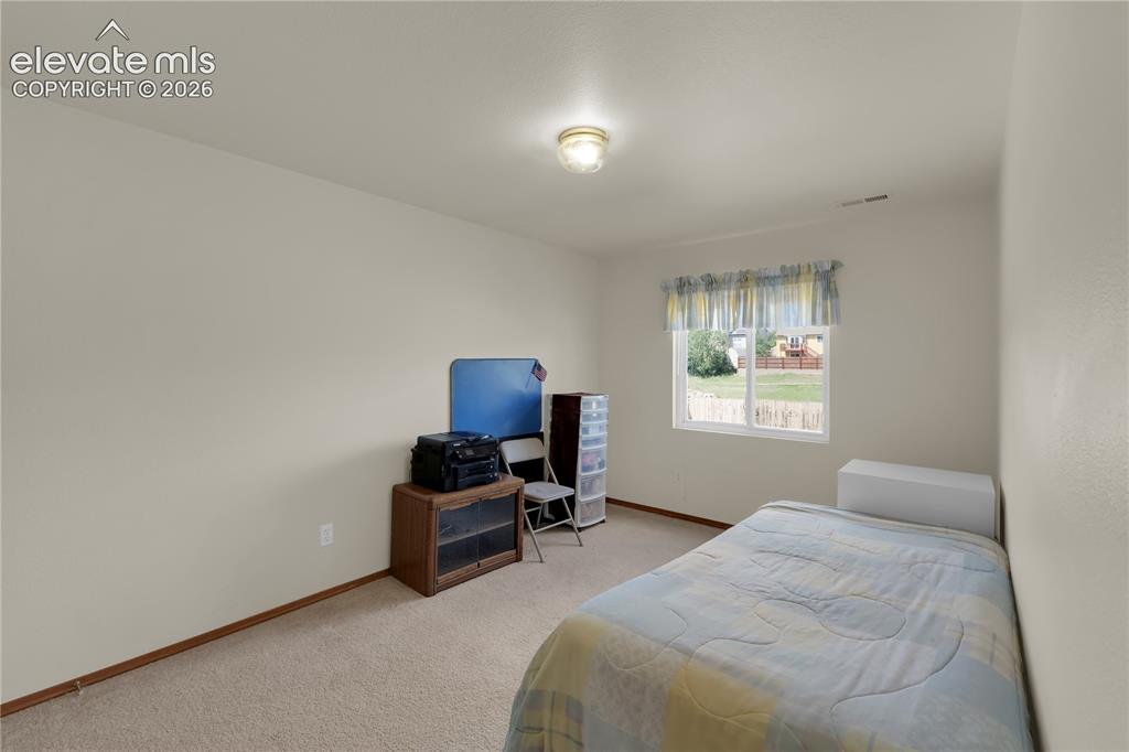 Image 19 of 27: Basement bedroom -2; great views