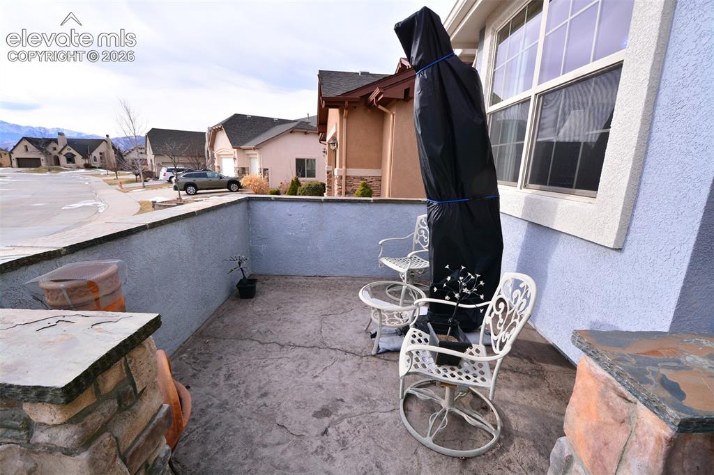 Image 3 of 45: Patio in front of home