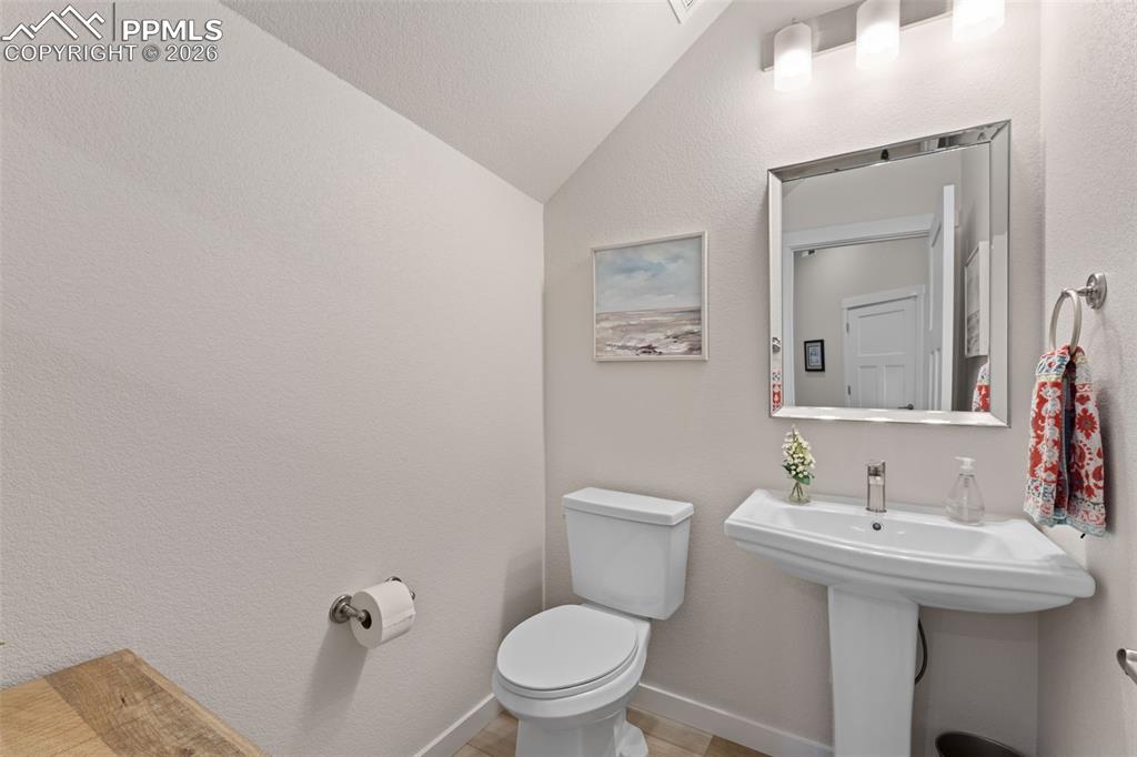 Image 15 of 42: Convenient powder room on main level