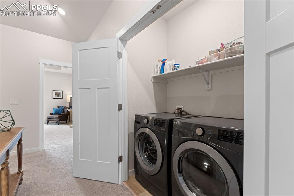 Image 29 of 42: Upstairs laundry has room for full size side-by-side machines