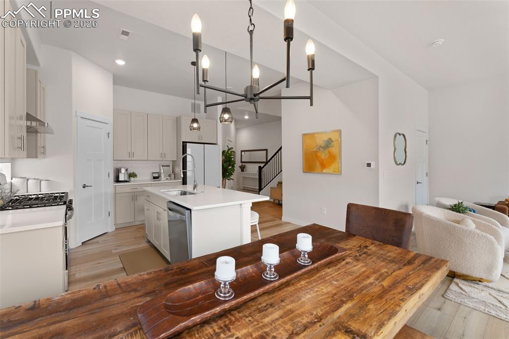 Image 7 of 42: Dining area has plenty of space