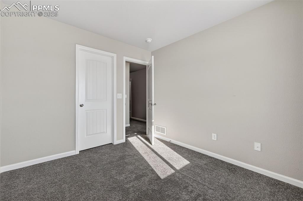 Image 27 of 38: Bedroom