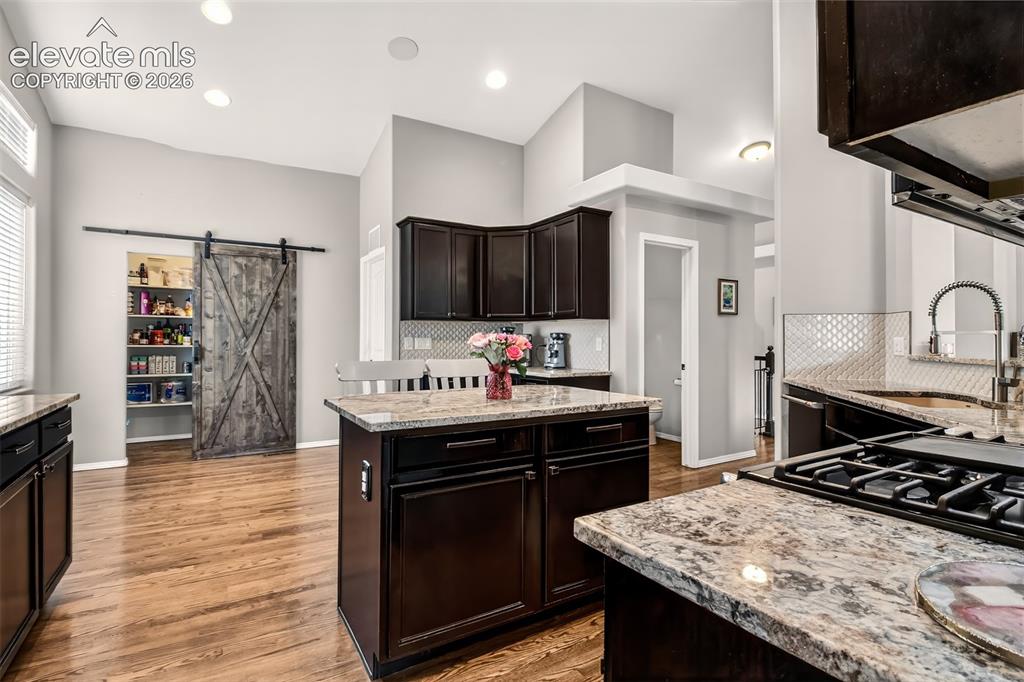 Image 14 of 41: Kitchen Island and Pantry