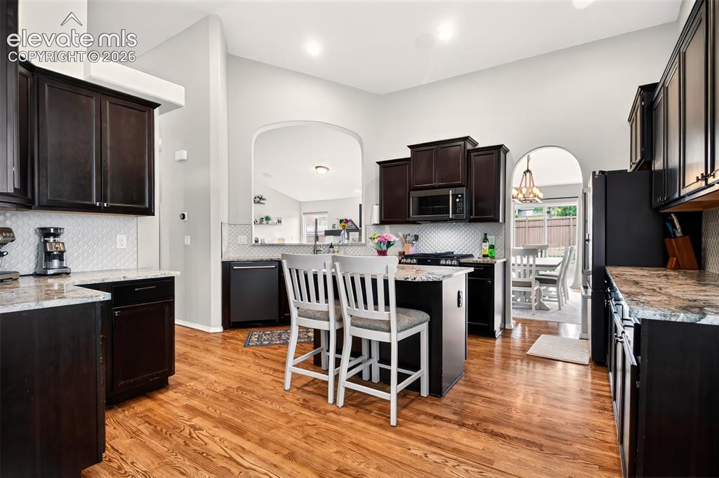 Image 16 of 41: Kitchen Island Breakfast bar