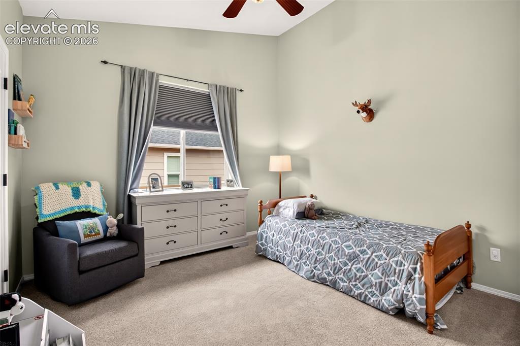 Image 22 of 41: Main level second bedroom